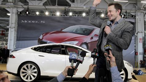 Tesla CEO Elon Musk: Cars all go self-driving in 20 years