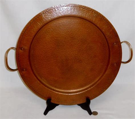 This circular hammered copper tray is perfect for any room in the house. Antique c. 1910 Roycroft Hammered Copper Large Handled ...