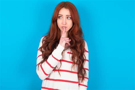 Premium Photo Woman Makes Silence Gesture Keeps Index Finger To Lips