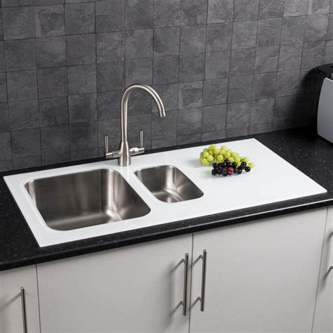 Buy great products from our ceramic sinks category online at wickes.co.uk. Sauber 1.5 Bowl Kitchen Sink with White Glass Surround and ...
