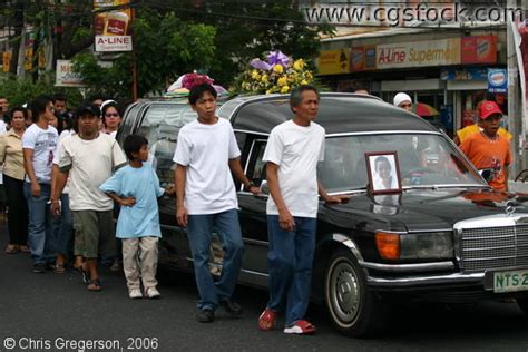 Stock Photo Filipino Father With Mourners During His Sons Funeral