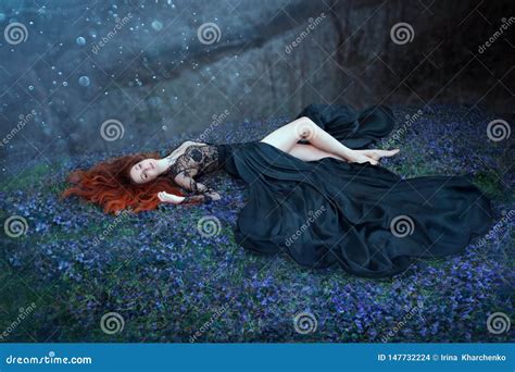 Girl With Red Hair Lying On Grass In Dark Forest Black Queen Lost In
