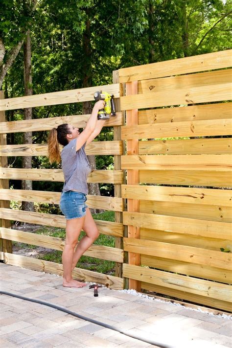 Stunning DIY Horizontal Slat Fence | Lifestyle | Fresh Mommy Blog | Horizontal slat fence, Diy ...