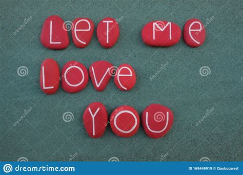 Let Me Love You Creative Text Composed With Red Colored And Carved