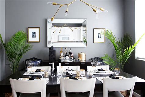 Whereas the darker option adds an edgy touch, a white dining room table with marble details evokes a luxe hollywood feel. Modern Glam Dining - Interiors By Color