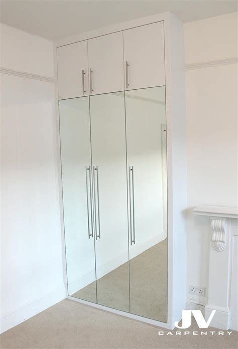 .sliding door wardrobes, fitted hinged door wardrobes, and customisable wardrobe interiors. Fitted Wardrobes | Bespoke Bedroom Furniture | JV Carpentry