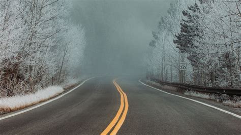 1920x1080 Road Between Snow Covered Trees 1080p Laptop Full Hd