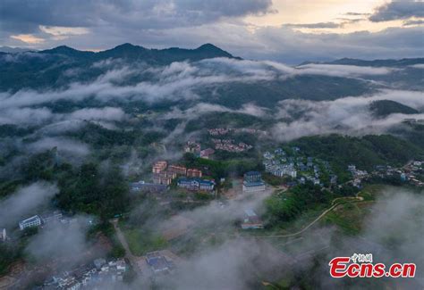 Orange Clouds Over Wuzhi Mountain At Dusk In Hainan