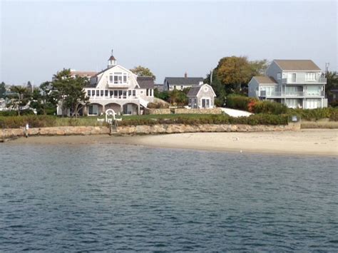 Houses On The Shore Line With Water In Front