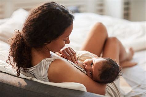 Woman Breastfeeding Telegraph