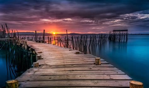 Wooden Pier At Sunset