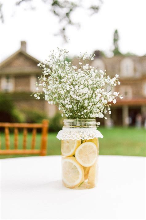 Charming Mason Jar Centerpieces With Fresh Lemon Slices And Babys