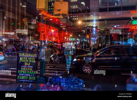 Reflections In A Window Times Square At Night Midtown Manhattan New