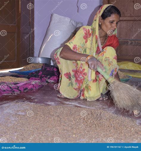 Rural Indian Women Cleaning Grain At Home Editorial Photography Image