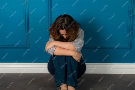 Free Photo Depressed Young Girl Sitting On The Floor And Crying High