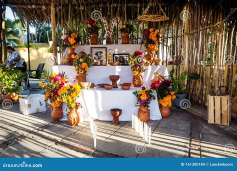 Traditional `dia De Los Muertos` Altar With Food Offerings Flowers And