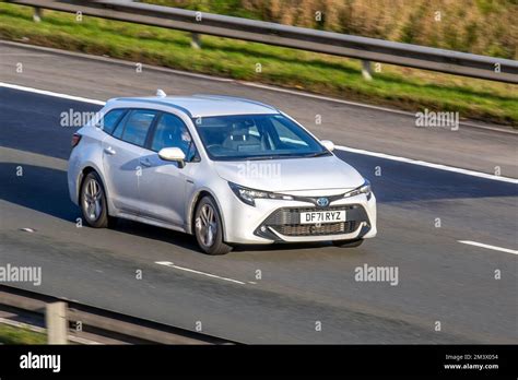 2022 White Toyota Corolla Icon Tech Hev Cvt Travelling On The M6