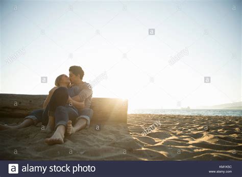 Couple Hugging Beach Sunset Stock Photos And Couple Hugging Beach Sunset