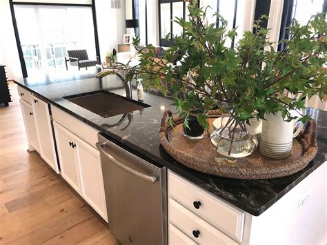 These stone kitchen sinks work well with dark or simple white countertops, creating a minimal design that you'll never grow tired of. Black Granite Countertops | Kitchen remodel countertops ...