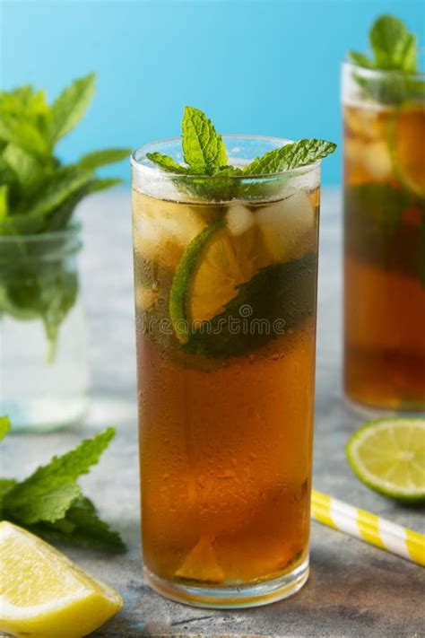 Iced Tea With Lemon Lime Summer Cold Fruit Drink With Mint Leaves