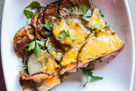 Slow cooker recipe with milk, cheese, and herbs. Slow-Cooker Scalloped Potatoes - Lisa G Cooks