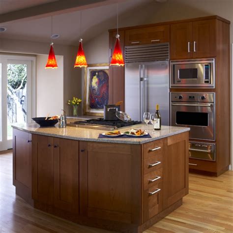 Hanging upper kitchen cabinets is the next step in this series. Kitchen Island Lighting System with Pendant and Chandelier ...