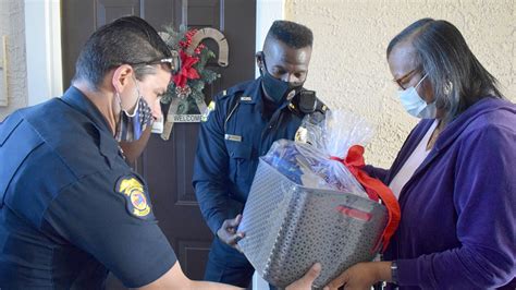 Panama City Florida police officers deliver gifts to seniors
