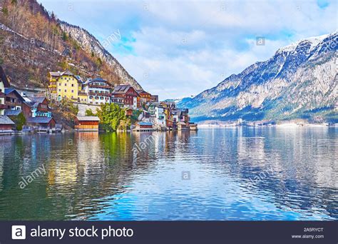 The Mountain Landscape From The Hallstattersee Lake Reflecting Alpine
