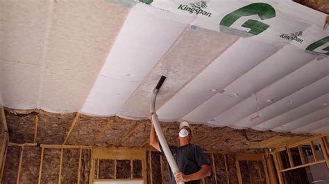 Insulating your garage ceiling could save you a lot of money on your heating bill. Insulation being blown in the garage - YouTube
