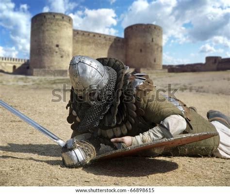 Medieval Warrior Defeated Lying Inside Fortress Stock Photo 66898615