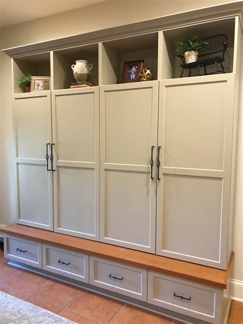 The white surface of this catch fits perfectly into the white interior of kitchen cabinets, bookshelves, vanities or any other cabinet you need to keep closed. Mudroom Cabinet Reveal - Stickers and Stilettos