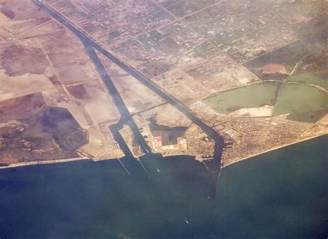 00:00first of all how significant is the suez canal for the globalcommodities trade and what exactly yeah well the canal is one of the busiest waterways and there'sa lot of oil that goes through the suez. File:Suez Canal, Port Said - ISS 2.jpg - Wikipedia