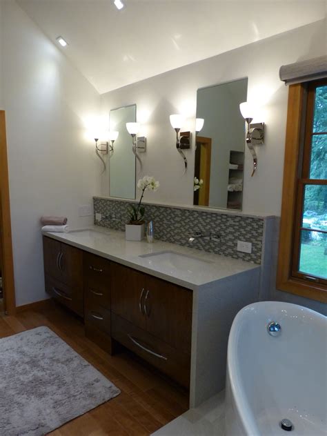 Counteract this effect by choosing a vanity with open storage, like in this bathroom by amy morris interiors. double vanity, clean lines | Modern bathroom, Corner ...