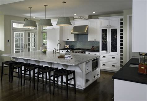 The only concession made for island seating is the roughly 8 inches of cantilevered (extended) counter at one end, so you can slip a diner's knees under. Large Kitchen Islands with Seating And Storage That Will ...