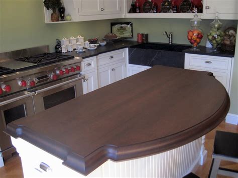 A varnique finish is as close to maintenance free for a wood counter top as you can get. Cherry Wood Countertop for a Kitchen Island in Greenwich, CT