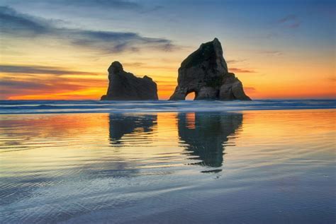 Sunset At Wharariki Beach New Zealand Alidays