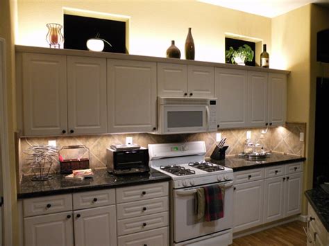Install a wine cellar above cabinets to get extra storage. Warm White Backlight modules under cabinet Lighting, backlighting - Super Nova 4 Warm White