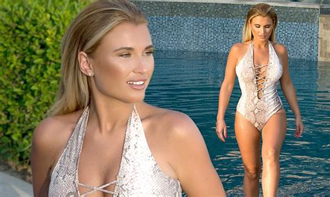 Towie S Billie Faiers Displays Her Ample Bosom In Lace Up Snake Print
