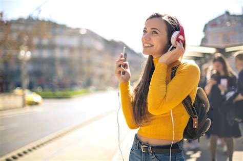 Premium Photo Beautiful Girl Listening Music With Headphone While