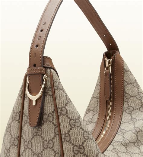 Gucci Nice Gg Supreme Canvas Hobo In Brown Lyst