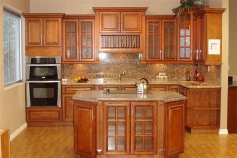 Islet kitchen or kitchen island can be seen as an ideal transition between the living room and kitchenette. Glazed RTA Maple Kitchen Cabinets in Minnesota, USA