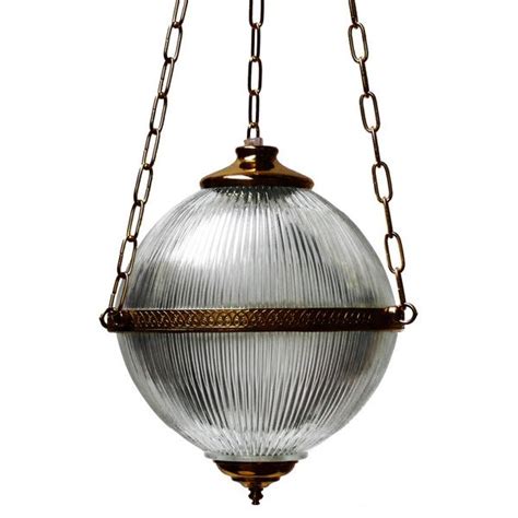 Featuring a shaped glass shade, this dimmable light fitting hangs from a twisted flex and is finished with an antique brass effect plate. BLAENAU VICTORIAN HOLOPHANE PENDANT | Contemporary Pendant ...