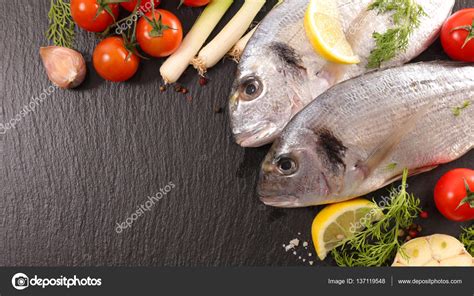 Raw Fish With Ingredients — Stock Photo © Studiom 137119548