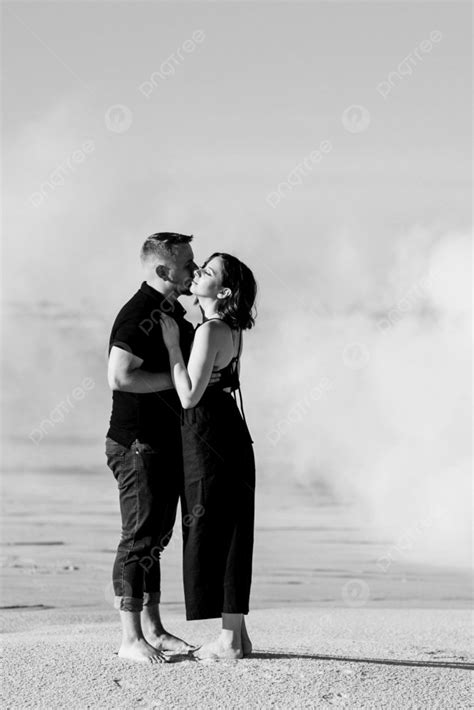 Guy And A Girl In Black Clothes Hug Inside A White Smoke Photo Background And Picture For Free
