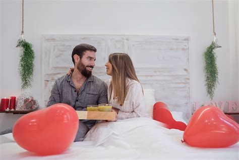 free photo couple with romantic breakfast on tray