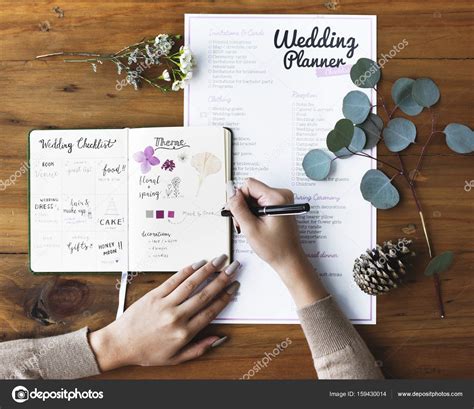 Hands Checking On Wedding Planner Notebook Stock Photo By ©rawpixel
