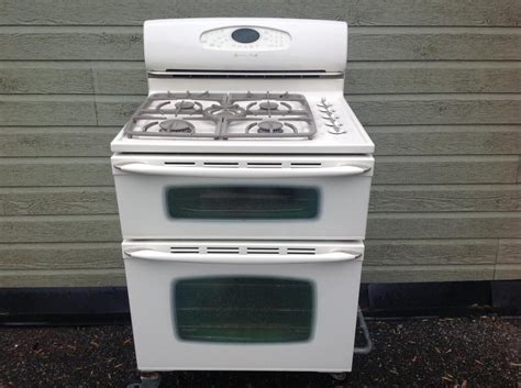 A single beep will indicate the oven is. Maytag Gemini double oven propane gas stove. Outside ...