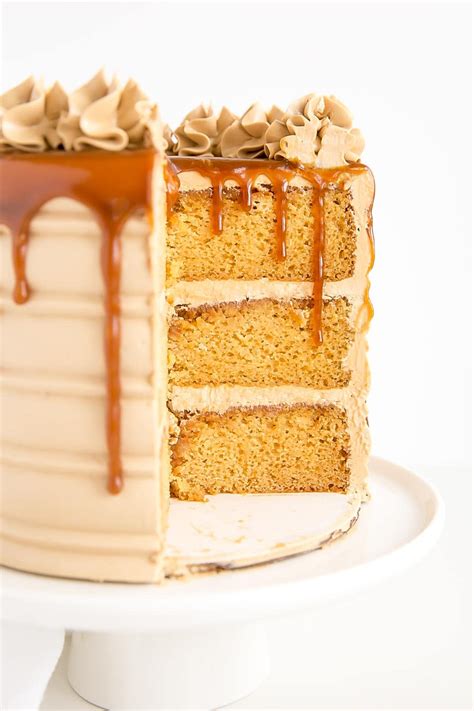 Cross Section Of A Caramel Cake With Caramel Dripping Down Salted