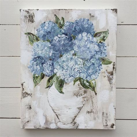 A Painting Of Blue Hydrangeas In A White Vase On A Wooden Paneled Wall