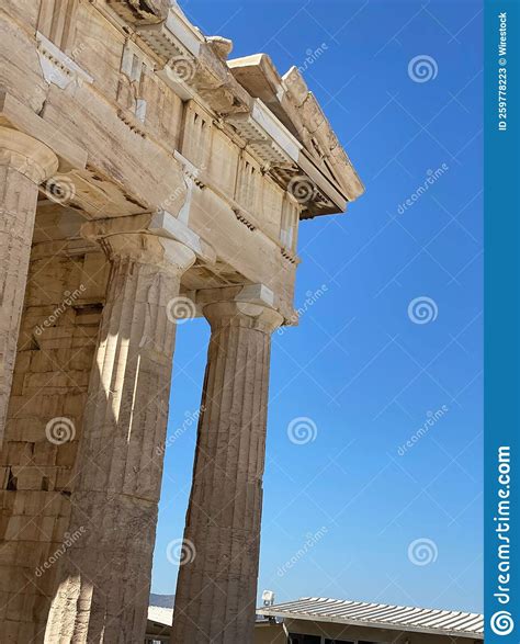 Vertical Shot Of The Acropolis During The Day In Athens Greece Stock